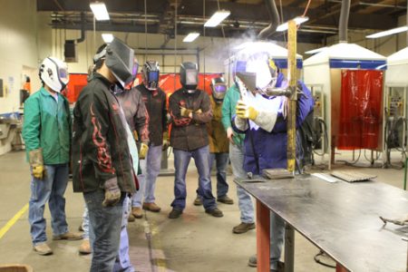 Welding students in class