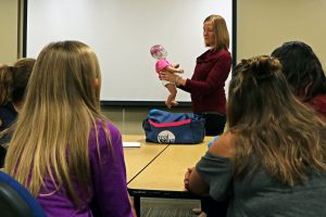 Students learning about the importance of preventing Shaken Baby Syndrome