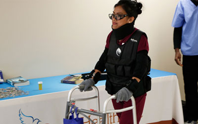 Dove student using Geriatric Simulator