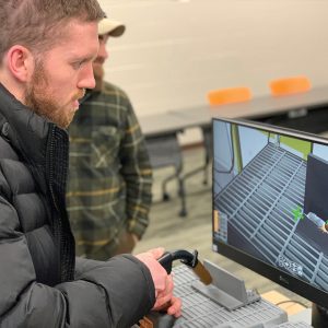 Student uses the guideWELD VR