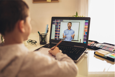 Child watching instructional webinar