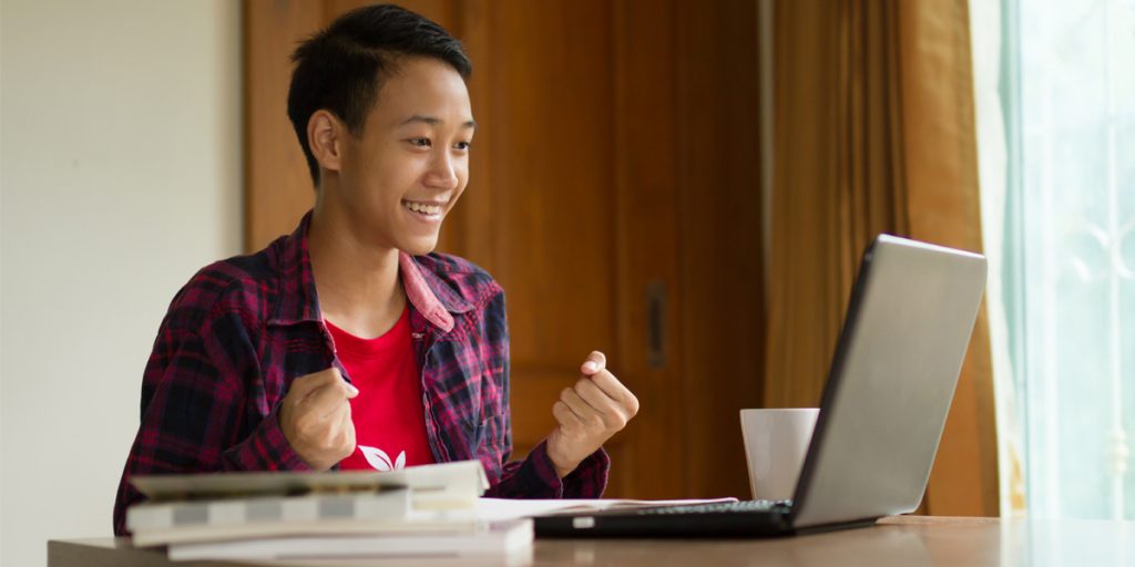 Teen at computer