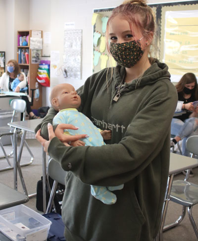 Student using RealCare Baby