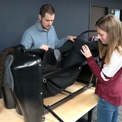 Student practicing bovine birthing