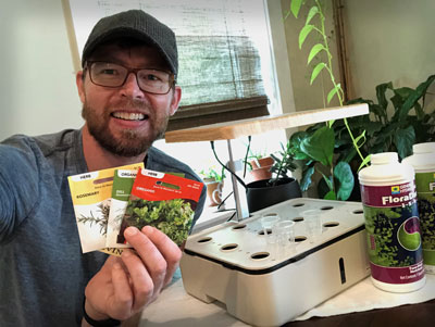 Allen with his hydroponics unit