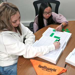 2 students using the Animal Clinic Design Kit