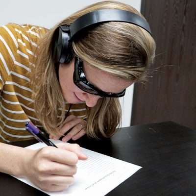 Woman using Concussion Education Kit