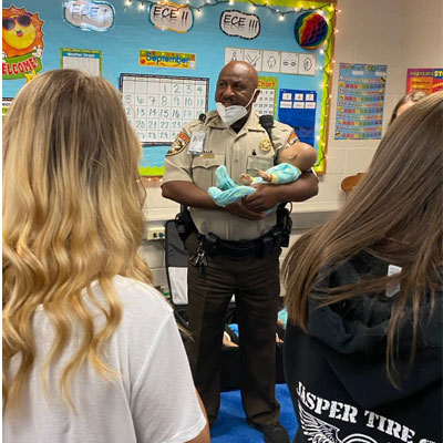 Resource officer with Baby