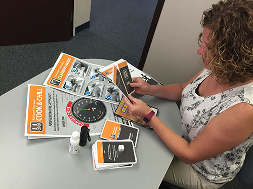 Teacher with Food Safety Kit