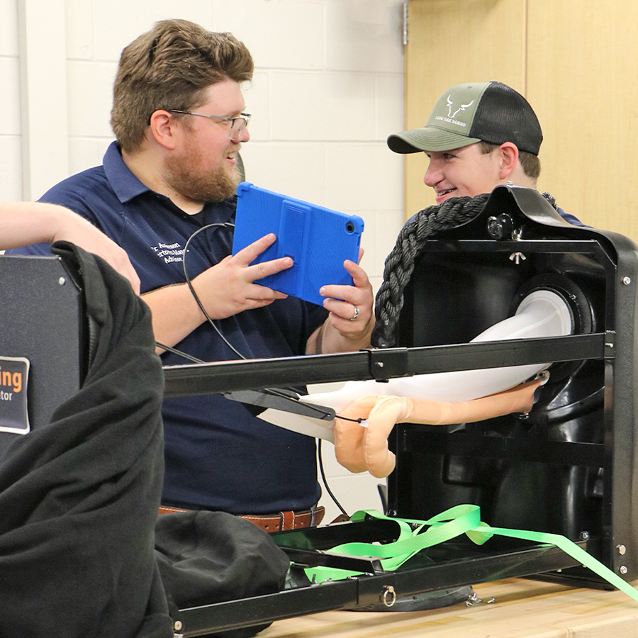 Nathan Anderson and Student Use the Bovine Ultrasound Simulator