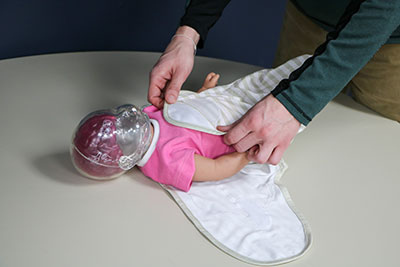 Student swaddling Shaken Baby